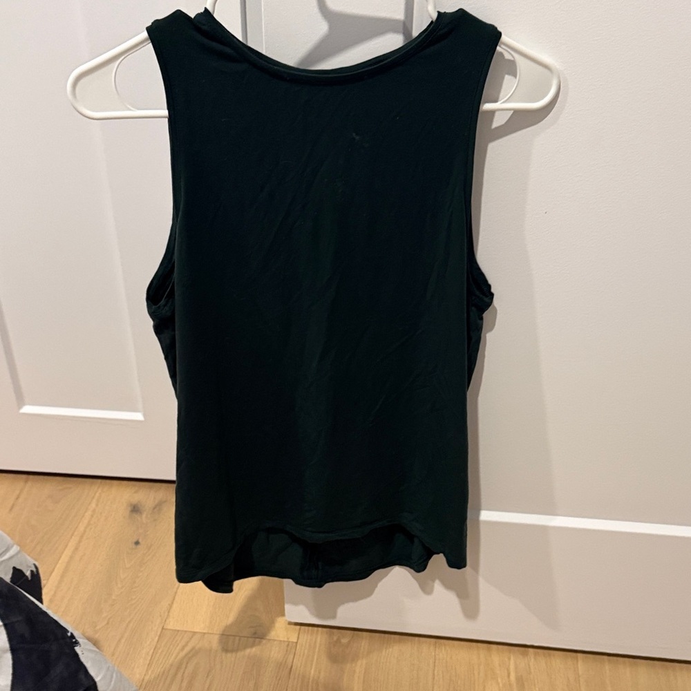 On running dark green Sleeveless Top for working out